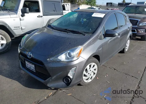 2015 Toyota Prius C from USA, damaged, VIN JTDKDTB33F1583432